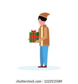 man holding gift box present happy new year merry christmas concept male cartoon character profile full length isolated vector illustration