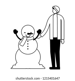 man holding hand to snowman