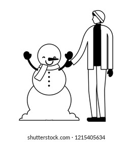 man holding hand to snowman