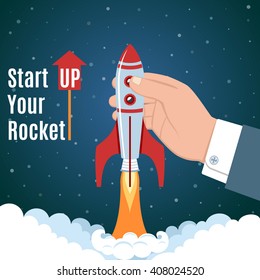 Man Holding In Hand A Starting Rocket . Startup And Growth Business Concept.
