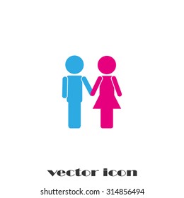man holding hand woman