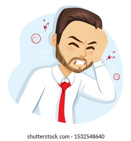 Man holding head with hand suffering hangover migraine pain