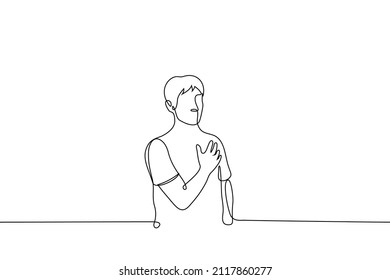 man holding his heart
