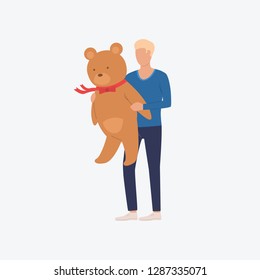 Man holding huge teddy bear. Romantic, boyfriend, greeting. Can be used for topics like Saint Valentines Day, festival, celebration