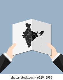 Man Holding a India Map 