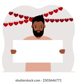 A man is holding a large blank sheet for text. There are many red hearts nearby. The concept of Happy Women, Valentine's Day, father's day, declaration of love or holiday.