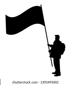 Man holding a large flag 