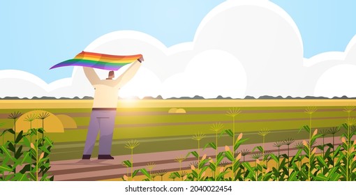 man holding lgbt rainbow flag gay lesbian love parade pride festival transgender love concept