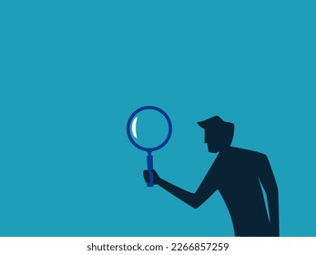 man holding a magnifying glass. Business analytics or information retrieval. concept of finance and investment