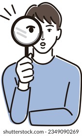 A man holding a magnifying glass and examining