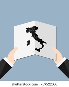 Man Holding A Map Of Italy 