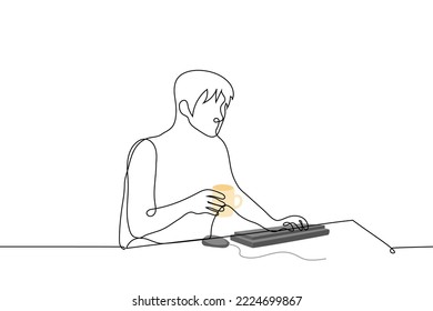 man holding mug sitting at computer - one line drawing vector. concept freelancer drinks tea from a mug while working