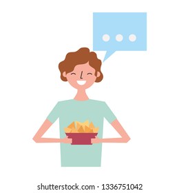 man holding nachos in bowl