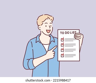 Man holding a notebook with written words To do list. Hand drawn style vector design illustrations.