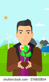 Man holding plant.