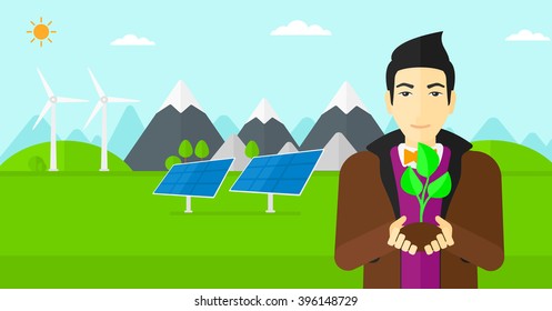 Hombre sujetando la planta.