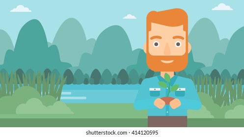 Man holding plant.