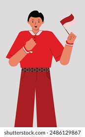 man holding a red and white flag on the left and clenching a fist on the right chest. Indonesian independence day