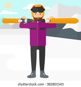 Mann, der Ski hält.
