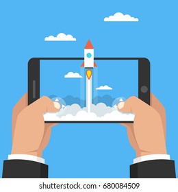 Man Holding Smartphone And Playing In Rocket Game. Mobile Gaming Concept. Flat Cartoon Style. Vector Illustration.