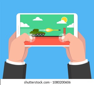 Man holding smartphone and playing in tank game. Mobile gaming concept. Flat cartoon style. Vector illustration.