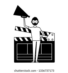 man holding speaker clapboard 