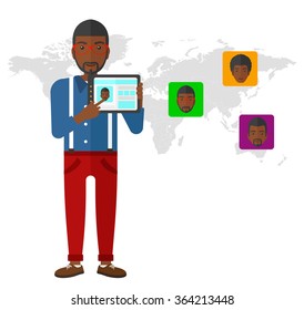 Man holding tablet computer with social media source.