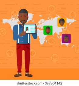Man holding tablet computer with social media source.