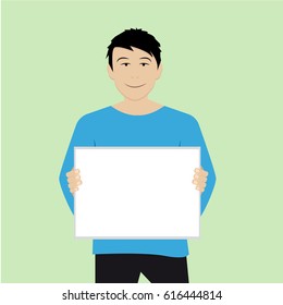 A man holding a white sheet of paper