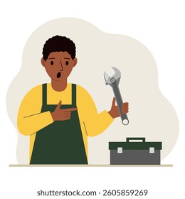 A man holds an adjustable wrench in his hand and a tool box next to it. The concept of technical repair or service. Flat design vector illustration.
