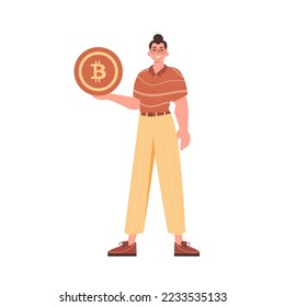 A man holds a bitcoin in the form of a coin in his hands. Character in trendy style.