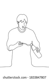 man holds a bottle from which he pours some kind of liquid into a spoon. one line drawing concept of a man who prepares by spoon measuring vinegar