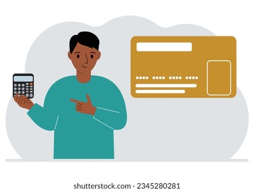 A man holds a calculator in his hand. Nearby is a large plastic card.