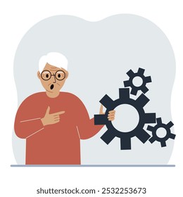 Um homem segura engrenagens na mão. Aponta um dedo para as rodas dentadas. O conceito de planejamento financeiro, movimento, vida, educação ou manutenção.