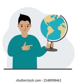 A man holds a globe in his hand and points his finger at it. The concept of education, teacher, world conquest, ecology. Vector flat illustration