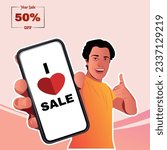 A man holds a hand touch screen smartphone with I love sale typography.