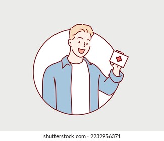 man holds in his hands a first aid kit. Hand drawn style vector design illustrations.