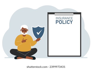 A man holds an insurance policy sign in his hands. The concept of life insurance, property or natural disasters.