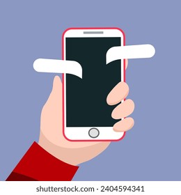 A man holds a phone in his hands. Sending a message