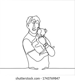 A man holds a puppy and smiles. A dog lover holds his pet in his arms. One continuous line drawing of a dog lover with a puppy. Can be used for animation.