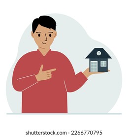 A man holds a small house in his palm. Concepts of inheritance, real estate transfer, mortgage, credit, loan or house purchase. Vector flat illustration