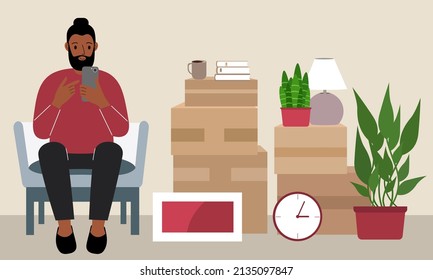 A man at home with a mobile phone sits in a chair. The concept of online registration of delivery of boxes, goods and assistance in moving. Flat vector illustration.