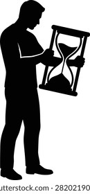 Man with hourglass, time passing, urgency, deadline, time management.