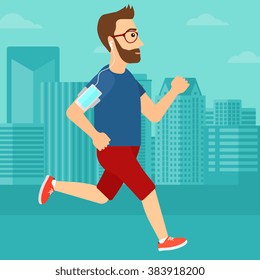 Man jogging with earphones and smartphone.