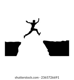 Man jumping over abyss between hill.