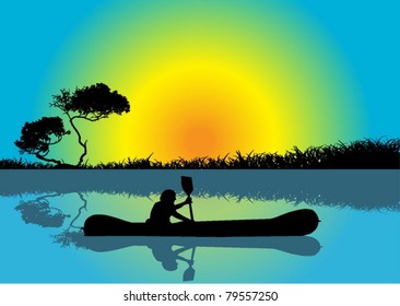 Man kayaking at sunrise