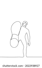 man kicks the viewer - one line drawing. concept of throwing the foot, hook with the foot 