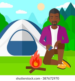 Man kindling fire.