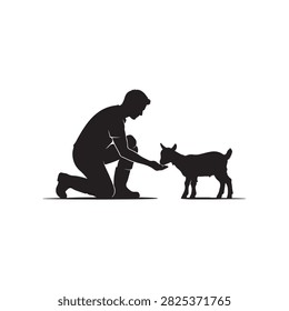 Man kneeling and feeding a young goat black silhouette