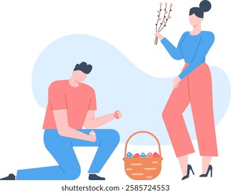 Man kneeling and holding easter eggs next to a basket full of colorful eggs and woman holding pussy willow branches, preparing for easter celebrations